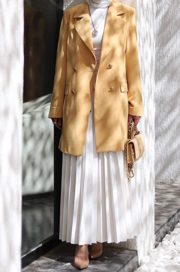 ⁨⁨⁨طقم بليزر أصفر مع تنورة بيضة بليسيه⁩⁩⁩