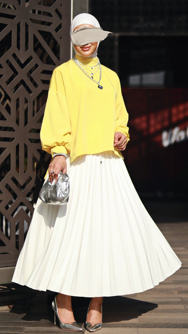 ⁨بدلة بلوزة صفرا سادة وتنورة⁩ بليسيه بيضة